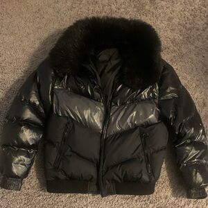 Jordan Craig Black puffer winter jacket. Like brand new! Zipper is broken